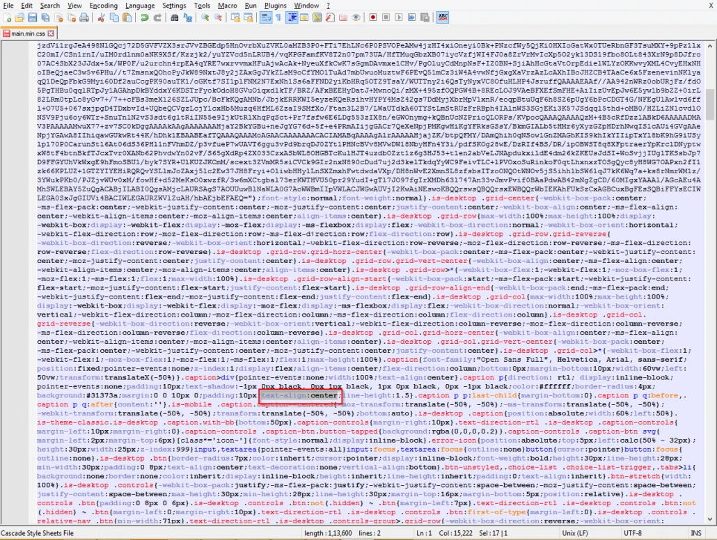 Notepad++ showing the original text-align:center;line-height:1.5 declaration in the caption styling block before editing